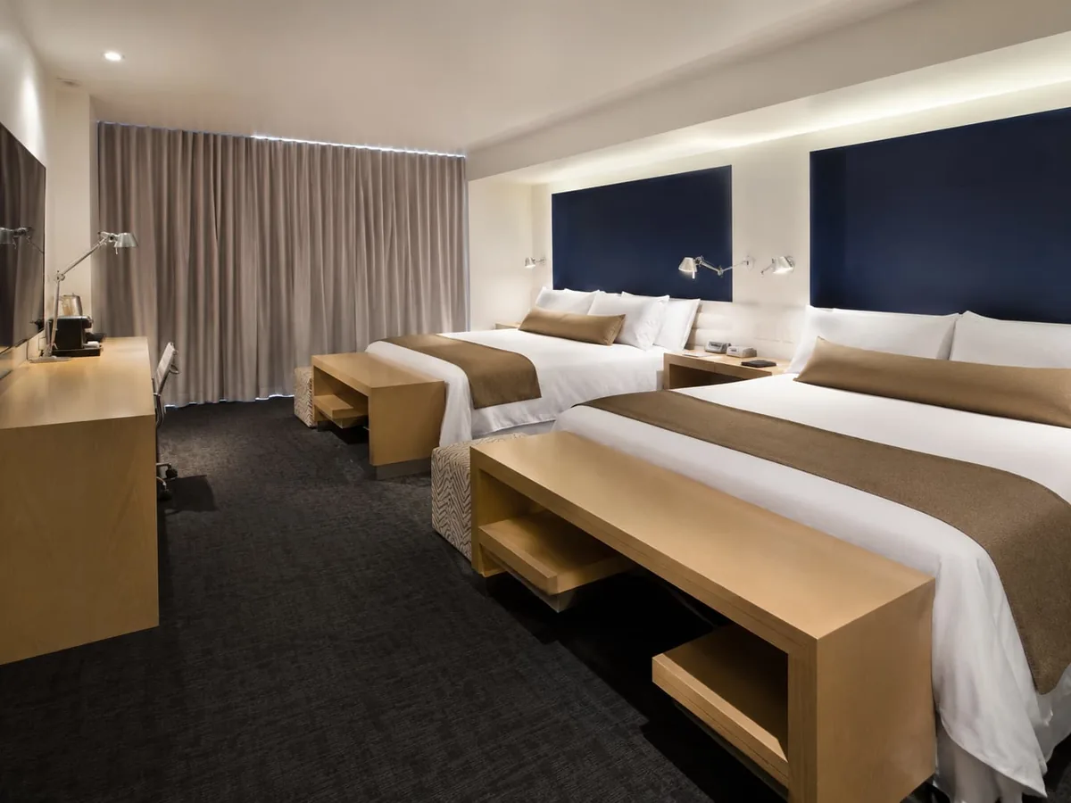 Habitación Doble King — CUARTA AVENIDA SUITES
