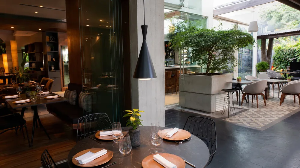 Restaurante Cuarta Avenida — CUARTA AVENIDA SUITES